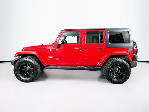 Used 2013 Jeep Wrangler Unlimited Sahara w/ Dual Top Group AWD/4WD image 4
