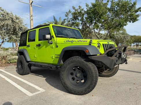 Used 2013 Jeep Wrangler Unlimited Sport AWD/4WD image 1