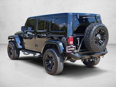 Used 2012 Jeep Wrangler Unlimited Rubicon w/ Dual Top Group AWD/4WD image 8