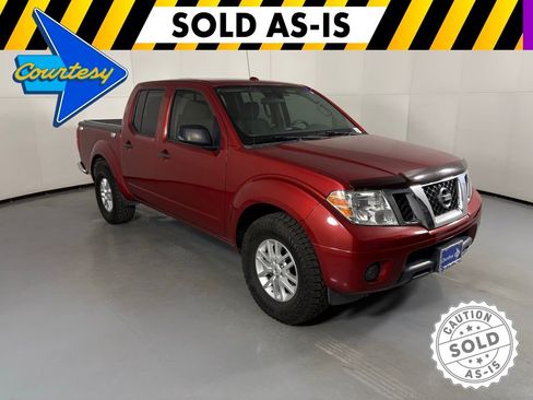 Used 2014 Nissan Frontier SV image 1
