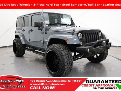 Used 2014 Jeep Wrangler Unlimited Sahara w/ Connectivity Group AWD/4WD image 1