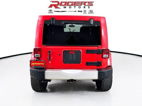 Used 2013 Jeep Wrangler Unlimited Sahara w/ Dual Top Group AWD/4WD image 7