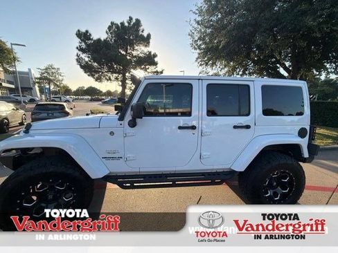 Used 2015 Jeep Wrangler Unlimited Sahara w/ Max Tow Package AWD/4WD image 1