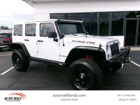 Used 2013 Jeep Wrangler Unlimited Rubicon w/ Dual Top Group AWD/4WD image 1