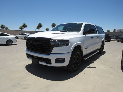 Used 2025 RAM 1500 Laramie w/ Night Edition AWD/4WD image 1