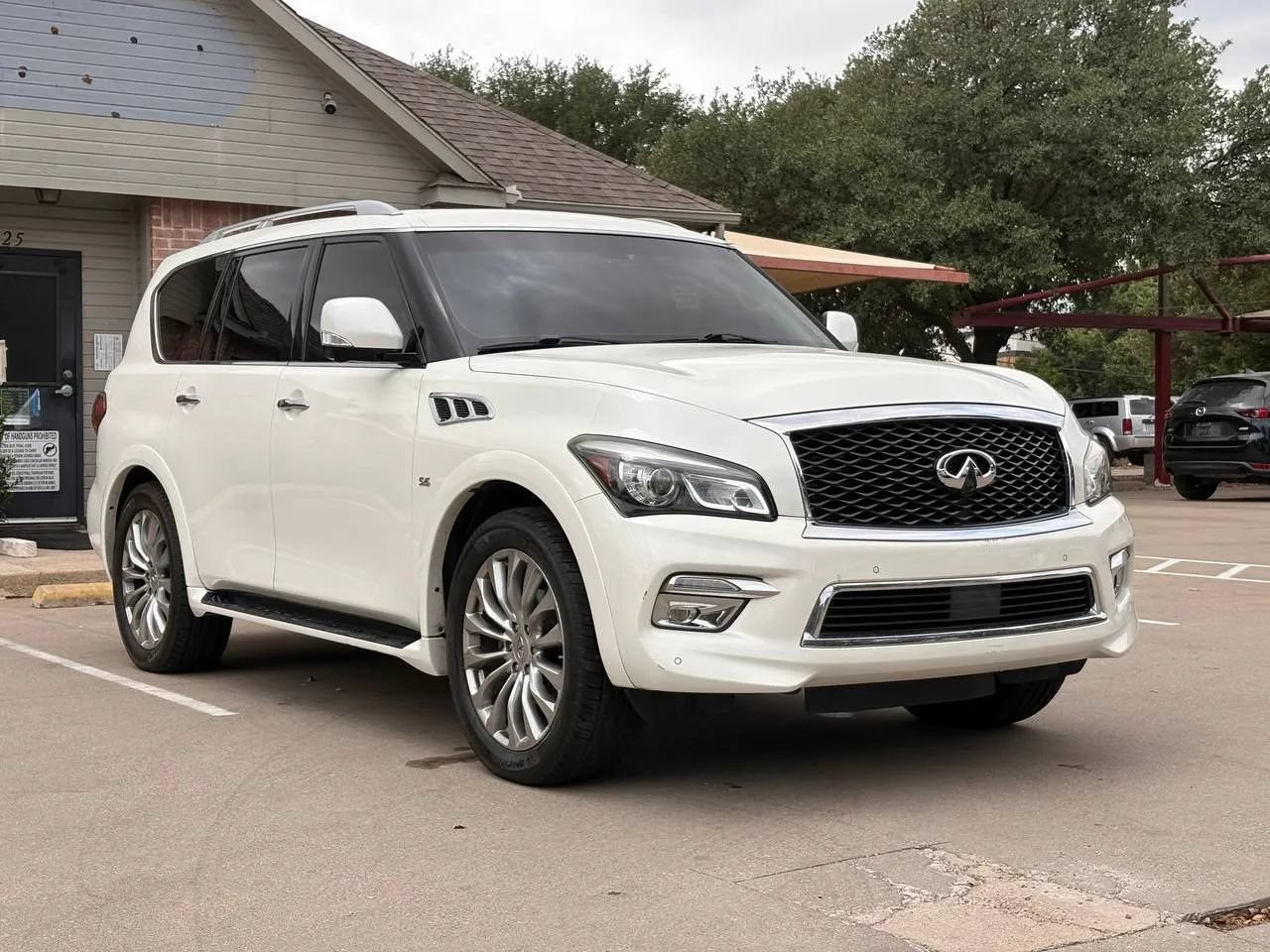 Used 2015 INFINITI QX80 4WD w/ 22" Wheel Package image 1