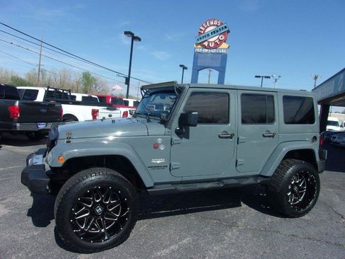 Used 2015 Jeep Wrangler Unlimited Sahara AWD/4WD image 1