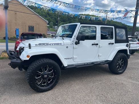 Used 2017 Jeep Wrangler Unlimited Sahara AWD/4WD image 1