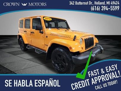 Used 2012 Jeep Wrangler Unlimited Rubicon w/ Dual Top Group
