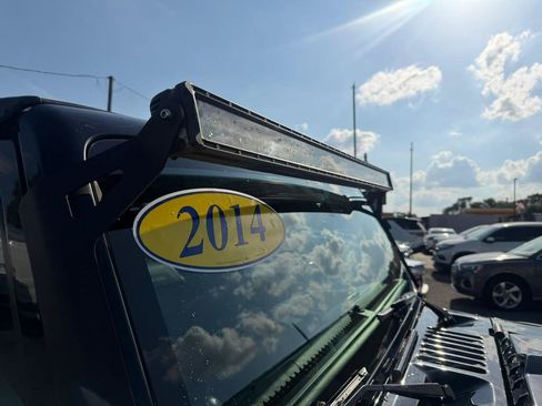 Used 2014 Jeep Wrangler Unlimited Rubicon w/ Dual Top Group AWD/4WD image 25