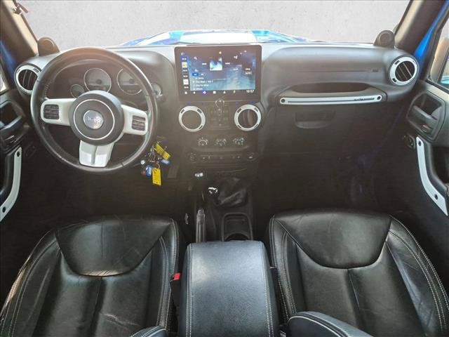Used 2014 Jeep Wrangler Unlimited Sahara AWD/4WD image 16