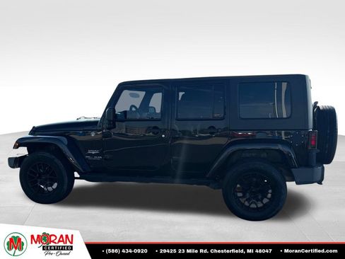 Used 2009 Jeep Wrangler Unlimited Sahara w/ Dual Top Group AWD/4WD image 2