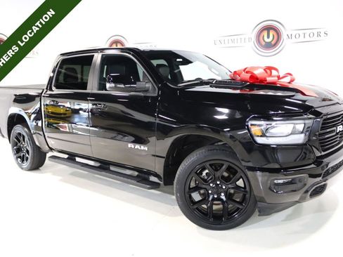 Used 2023 RAM 1500 Laramie AWD/4WD image 1