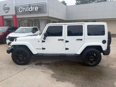 Used 2014 Jeep Wrangler Unlimited Sahara AWD/4WD image 1