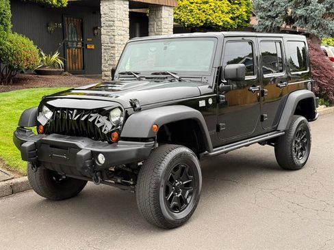 Used 2013 Jeep Wrangler Unlimited Sahara image 1