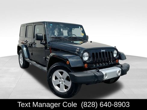 Used 2012 Jeep Wrangler Unlimited Sahara w/ Dual Top Group image 1