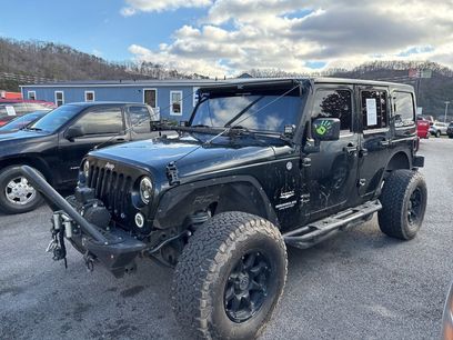 Used 2012 Jeep Wrangler Unlimited Sahara w/ Dual Top Group