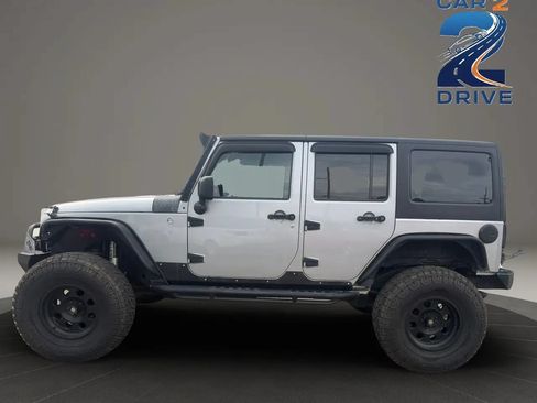 Used 2014 Jeep Wrangler Unlimited Sahara AWD/4WD image 9