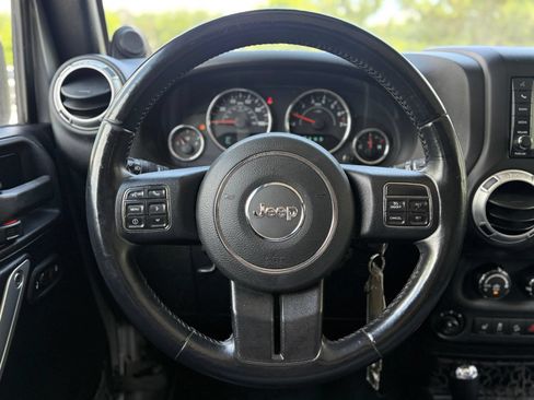 Used 2014 Jeep Wrangler Unlimited Rubicon w/ Dual Top Group AWD/4WD image 25
