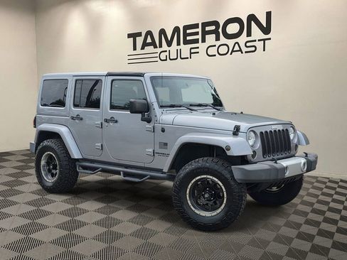 Used 2015 Jeep Wrangler Unlimited Sahara AWD/4WD image 1