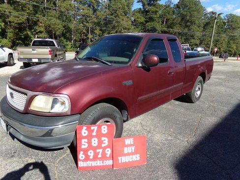 Used 1999 Ford F150 2WD SuperCab image 1