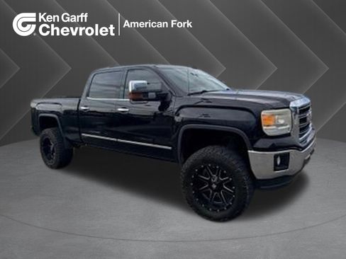 Used 2015 GMC Sierra 1500 SLT w/ SLT Crew Cab Value Package AWD/4WD image 1