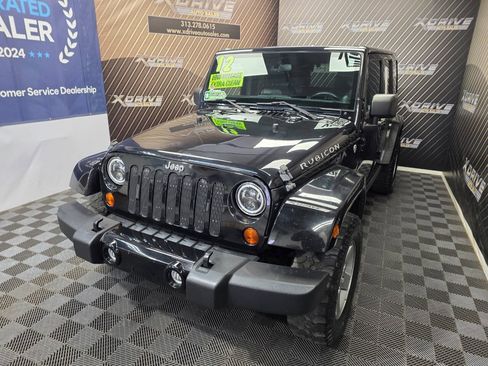 Used 2012 Jeep Wrangler Unlimited Rubicon w/ Dual Top Group AWD/4WD image 2