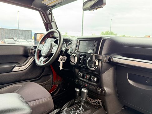 Used 2013 Jeep Wrangler Unlimited Rubicon w/ Dual Top Group AWD/4WD image 17