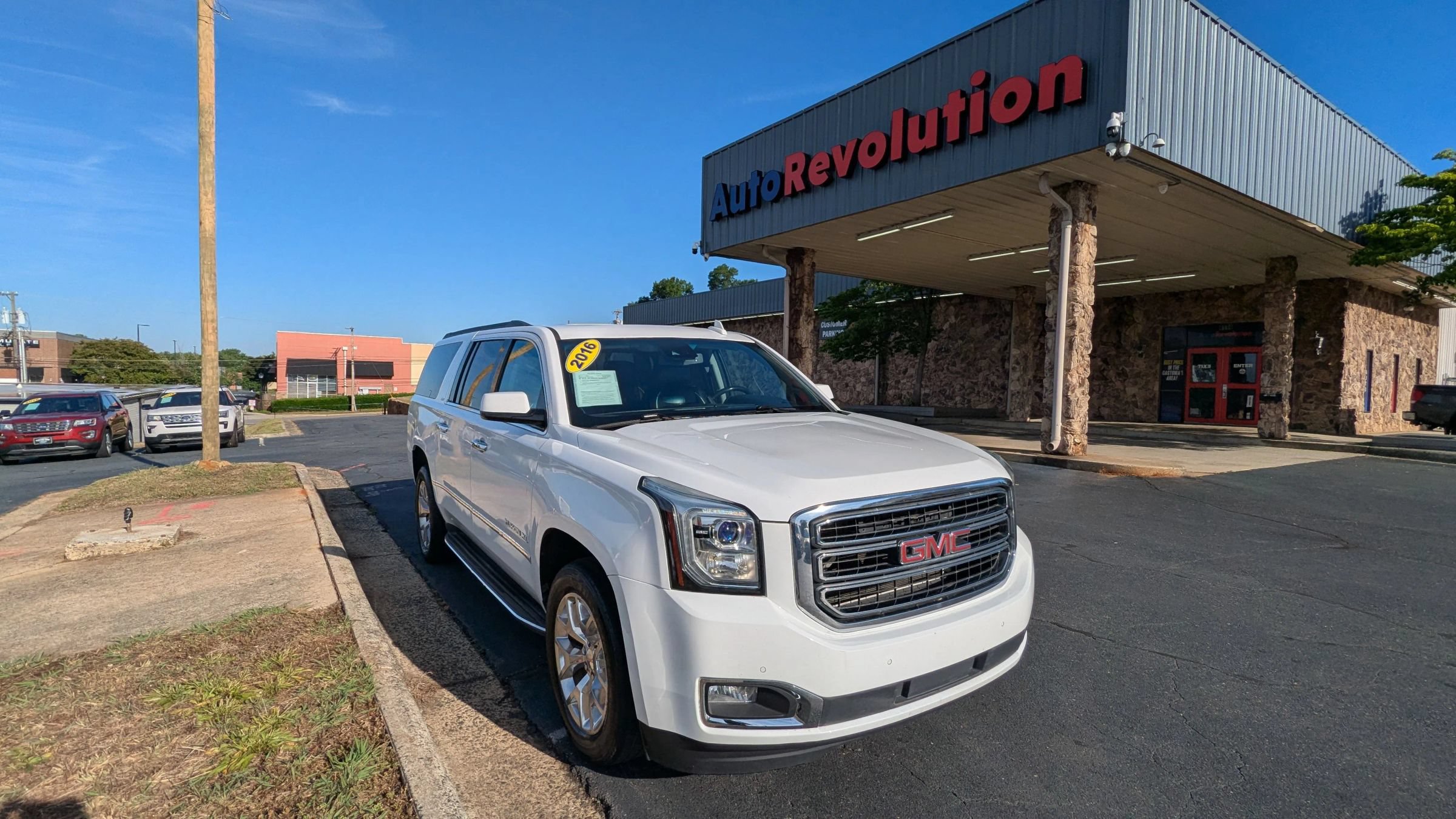 Used 2016 GMC Yukon XL SLT w/ Open Road Package AWD/4WD image 1