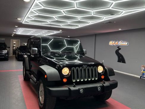 Used 2010 Jeep Wrangler Unlimited Sport image 1