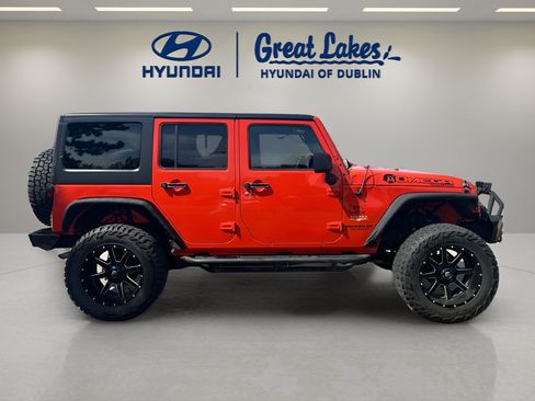 Used 2015 Jeep Wrangler Unlimited Sahara w/ Dual Top Group AWD/4WD image 7