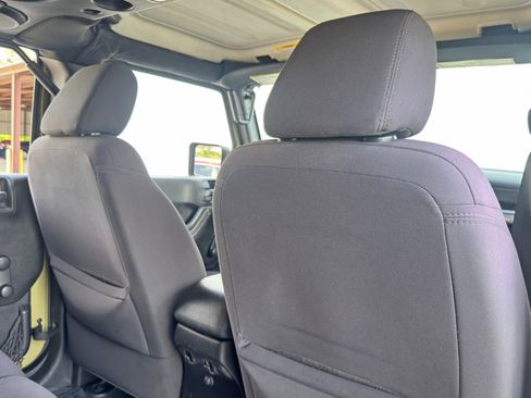 Used 2013 Jeep Wrangler Unlimited Sport w/ Mopar Black Appearance Group image 28