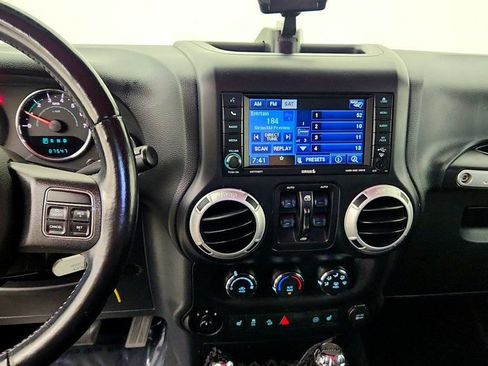 Used 2012 Jeep Wrangler Unlimited Sahara w/ Dual Top Group AWD/4WD image 18