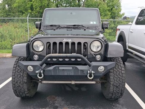 Used 2014 Jeep Wrangler Unlimited Sahara w/ Dual Top Group AWD/4WD image 2