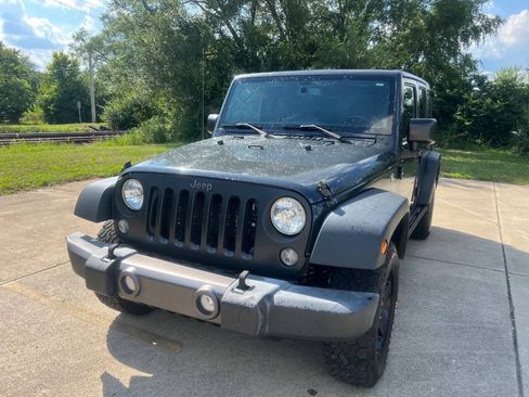 Used 2016 Jeep Wrangler Unlimited Sport AWD/4WD image 1