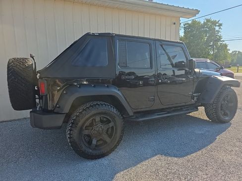 Used 2015 Jeep Wrangler Unlimited Sahara w/ Dual Top Group AWD/4WD image 4