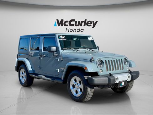 Used 2015 Jeep Wrangler Unlimited Sahara w/ Connectivity Group AWD/4WD image 1