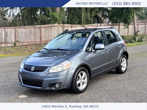 Used 2009 Suzuki SX4 AWD Hatchback w/ Touring Pkg image 1