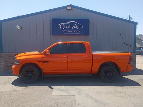 Used 2015 RAM 1500 Sport w/ Ignition Orange Sport Package AWD/4WD image 1