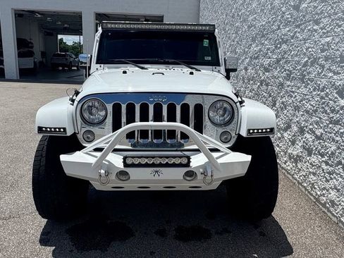 Used 2014 Jeep Wrangler Unlimited Sahara w/ Mopar Chrome Edition Group AWD/4WD image 7