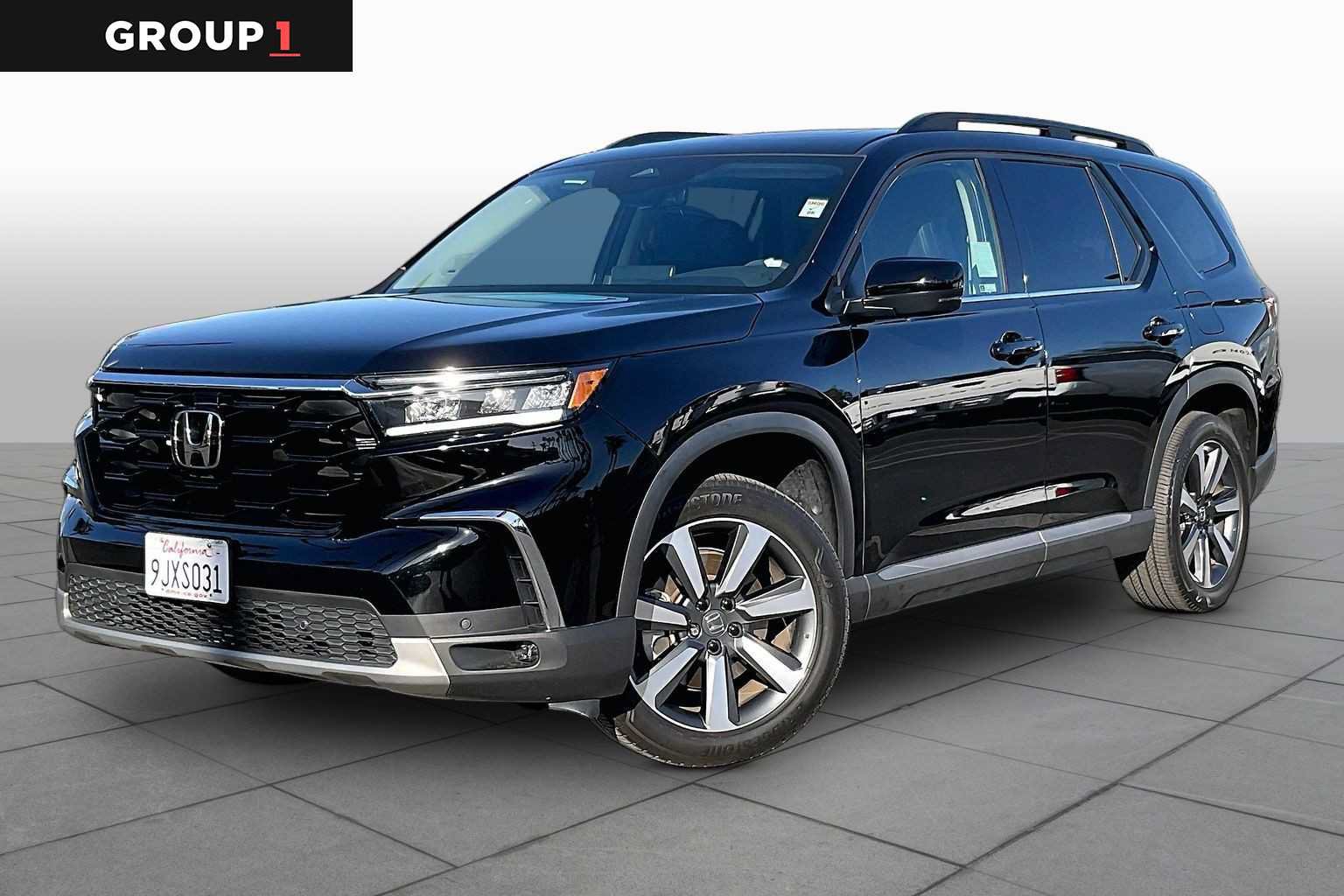 Used 2024 Honda Pilot Touring image 1