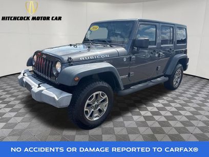 Used 2014 Jeep Wrangler Unlimited Rubicon w/ Dual Top Group