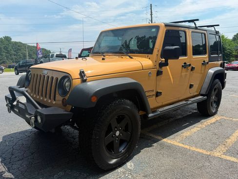 Used 2013 Jeep Wrangler Unlimited Sport AWD/4WD image 2