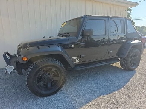 Used 2015 Jeep Wrangler Unlimited Sahara w/ Dual Top Group AWD/4WD image 10