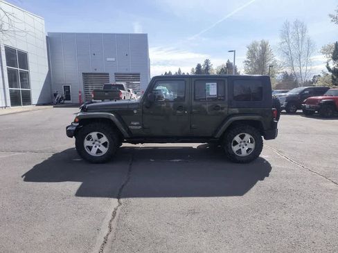 Used 2009 Jeep Wrangler Unlimited Sahara w/ Dual Top Group image 2
