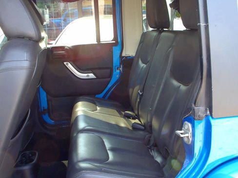 Used 2015 Jeep Wrangler Unlimited Sahara w/ Katzkin Premium Leather Group AWD/4WD image 11