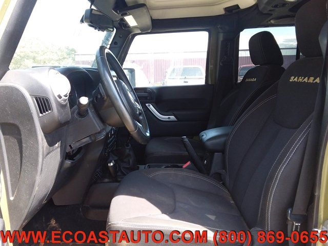 Used 2013 Jeep Wrangler Unlimited Sahara w/ Dual Top Group AWD/4WD image 10