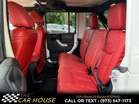 Used 2013 Jeep Wrangler Unlimited Sahara w/ Dual Top Group AWD/4WD image 16