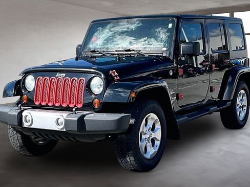 Used 2013 Jeep Wrangler Unlimited Sahara w/ Dual Top Group image 2