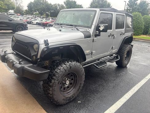 Used 2014 Jeep Wrangler Unlimited Sahara w/ Max Tow Package AWD/4WD image 1
